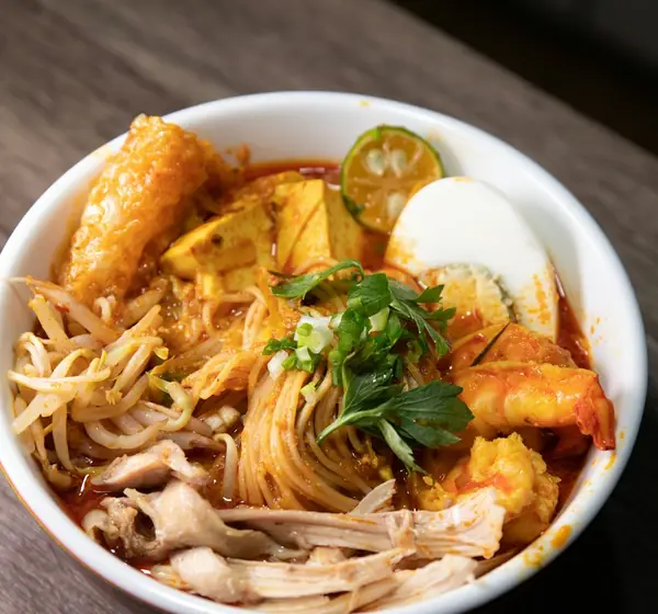 A bowl of curry laksa